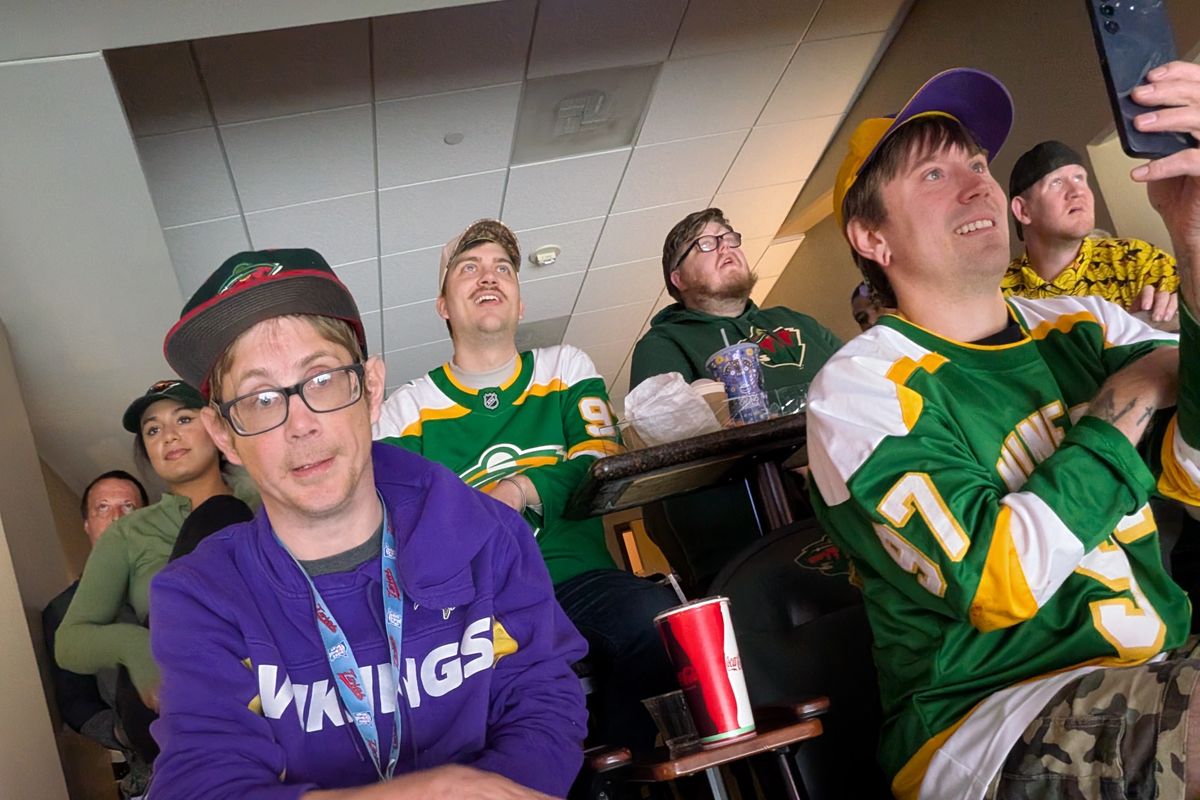 Friends in the suite locked in on the game